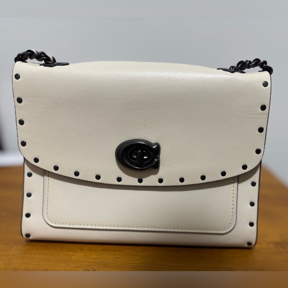 Cream Leather Shoulder Bag with Black Studs. Can be worn as crossbody